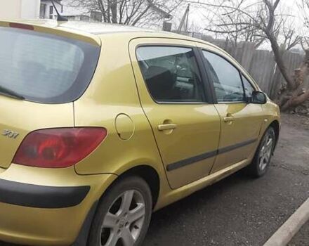 Жовтий Пежо 307, об'ємом двигуна 2 л та пробігом 210 тис. км за 3499 $, фото 5 на Automoto.ua