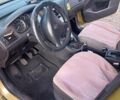 Желтый Пежо 307, объемом двигателя 1.36 л и пробегом 301 тыс. км за 4000 $, фото 9 на Automoto.ua