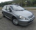 Серый Пежо 307, объемом двигателя 1.6 л и пробегом 200 тыс. км за 1965 $, фото 1 на Automoto.ua