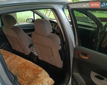 Серый Пежо 307, объемом двигателя 2 л и пробегом 260 тыс. км за 3500 $, фото 4 на Automoto.ua