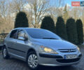 Сірий Пежо 307, об'ємом двигуна 1.4 л та пробігом 380 тис. км за 2999 $, фото 41 на Automoto.ua