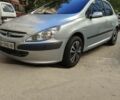 Сірий Пежо 307, об'ємом двигуна 1.4 л та пробігом 245 тис. км за 2249 $, фото 1 на Automoto.ua