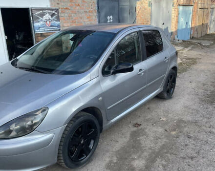 Сірий Пежо 307, об'ємом двигуна 2 л та пробігом 350 тис. км за 3950 $, фото 1 на Automoto.ua