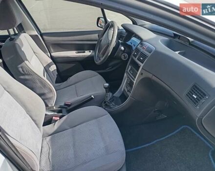 Сірий Пежо 307, об'ємом двигуна 2 л та пробігом 355 тис. км за 3300 $, фото 8 на Automoto.ua