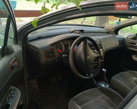Серый Пежо 307, объемом двигателя 2 л и пробегом 260 тыс. км за 3500 $, фото 5 на Automoto.ua