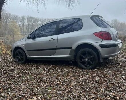 Серый Пежо 307, объемом двигателя 1.4 л и пробегом 312 тыс. км за 2300 $, фото 1 на Automoto.ua