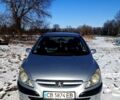 Серый Пежо 307, объемом двигателя 1.59 л и пробегом 248 тыс. км за 3900 $, фото 1 на Automoto.ua