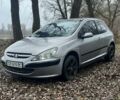 Серый Пежо 307, объемом двигателя 1.4 л и пробегом 312 тыс. км за 2300 $, фото 1 на Automoto.ua