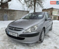 Серый Пежо 307, объемом двигателя 1.4 л и пробегом 201 тыс. км за 3200 $, фото 1 на Automoto.ua