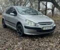 Серый Пежо 307, объемом двигателя 1.4 л и пробегом 312 тыс. км за 2300 $, фото 1 на Automoto.ua