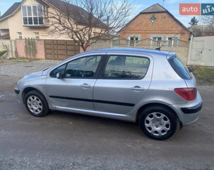 Серый Пежо 307, объемом двигателя 1.4 л и пробегом 200 тыс. км за 2950 $, фото 8 на Automoto.ua