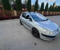 Серый Пежо 307, объемом двигателя 1.4 л и пробегом 258 тыс. км за 3800 $, фото 1 на Automoto.ua