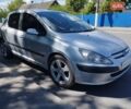 Серый Пежо 307, объемом двигателя 2 л и пробегом 460 тыс. км за 3180 $, фото 1 на Automoto.ua