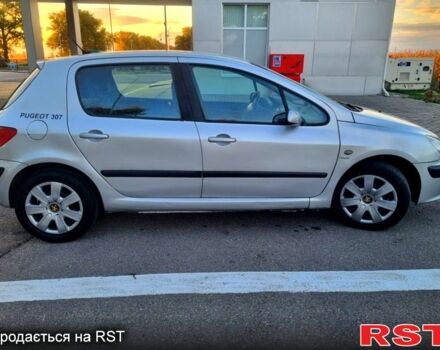 Серый Пежо 307, объемом двигателя 2 л и пробегом 270 тыс. км за 3100 $, фото 2 на Automoto.ua