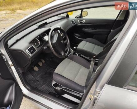 Серый Пежо 307, объемом двигателя 1.59 л и пробегом 146 тыс. км за 4300 $, фото 11 на Automoto.ua