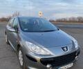 Сірий Пежо 307, об'ємом двигуна 1.4 л та пробігом 253 тис. км за 4100 $, фото 1 на Automoto.ua