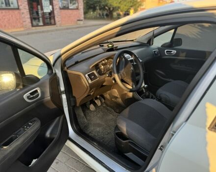 Серый Пежо 307, объемом двигателя 2 л и пробегом 254 тыс. км за 3500 $, фото 4 на Automoto.ua