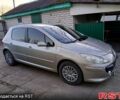 Серый Пежо 307, объемом двигателя 1.6 л и пробегом 132 тыс. км за 5300 $, фото 1 на Automoto.ua