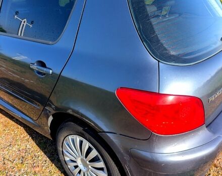 Серый Пежо 307, объемом двигателя 2 л и пробегом 450 тыс. км за 1999 $, фото 5 на Automoto.ua