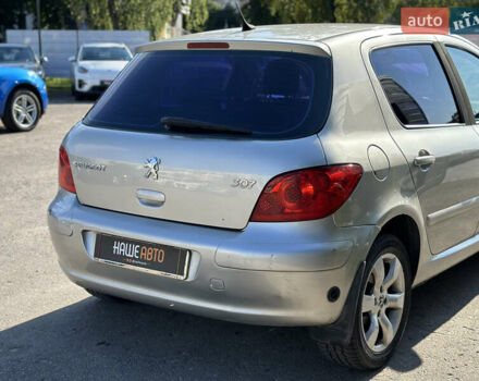 Сірий Пежо 307, об'ємом двигуна 2 л та пробігом 210 тис. км за 4500 $, фото 21 на Automoto.ua