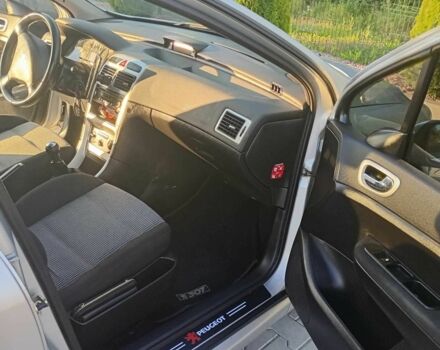 Серый Пежо 307, объемом двигателя 1.6 л и пробегом 241 тыс. км за 4200 $, фото 6 на Automoto.ua