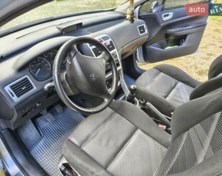 Серый Пежо 307, объемом двигателя 2 л и пробегом 185 тыс. км за 4400 $, фото 34 на Automoto.ua