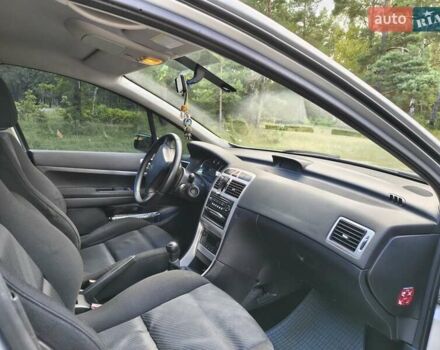 Серый Пежо 307, объемом двигателя 2 л и пробегом 185 тыс. км за 4400 $, фото 31 на Automoto.ua