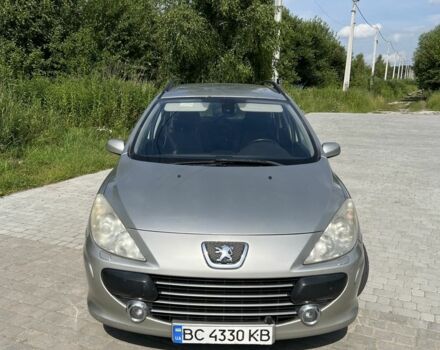 Серый Пежо 307, объемом двигателя 1.6 л и пробегом 208 тыс. км за 3900 $, фото 1 на Automoto.ua