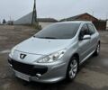 Серый Пежо 307, объемом двигателя 2 л и пробегом 220 тыс. км за 4900 $, фото 1 на Automoto.ua