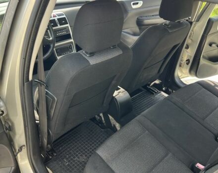 Серый Пежо 307, объемом двигателя 1.6 л и пробегом 208 тыс. км за 3900 $, фото 12 на Automoto.ua