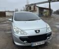 Серый Пежо 307, объемом двигателя 2 л и пробегом 220 тыс. км за 4900 $, фото 2 на Automoto.ua