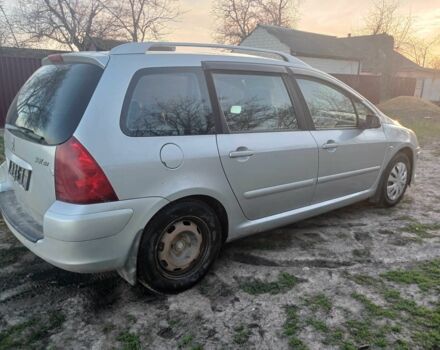 Серый Пежо 307, объемом двигателя 2 л и пробегом 200 тыс. км за 4100 $, фото 5 на Automoto.ua