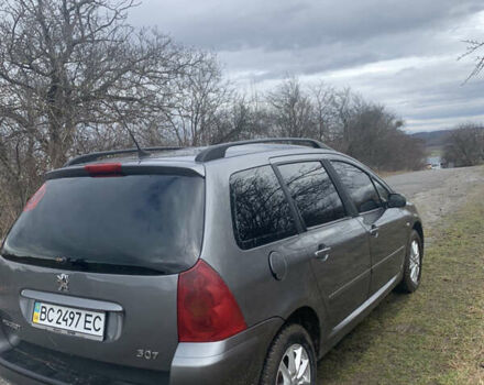 Сірий Пежо 307, об'ємом двигуна 1.59 л та пробігом 275 тис. км за 2999 $, фото 4 на Automoto.ua