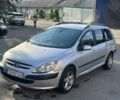 Серый Пежо 307, объемом двигателя 2 л и пробегом 303 тыс. км за 1500 $, фото 1 на Automoto.ua