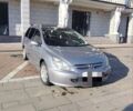 Серый Пежо 307, объемом двигателя 1.6 л и пробегом 300 тыс. км за 3100 $, фото 1 на Automoto.ua