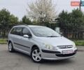 Серый Пежо 307, объемом двигателя 2 л и пробегом 255 тыс. км за 3599 $, фото 1 на Automoto.ua