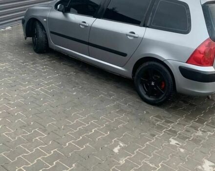 Серый Пежо 307, объемом двигателя 1.6 л и пробегом 333 тыс. км за 3300 $, фото 6 на Automoto.ua