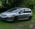 Серый Пежо 307, объемом двигателя 1.6 л и пробегом 333 тыс. км за 3300 $, фото 2 на Automoto.ua