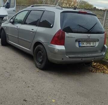 Сірий Пежо 307, об'ємом двигуна 2.01 л та пробігом 324 тис. км за 3000 $, фото 11 на Automoto.ua