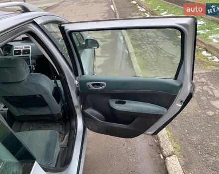 Сірий Пежо 307, об'ємом двигуна 1.59 л та пробігом 300 тис. км за 2000 $, фото 27 на Automoto.ua