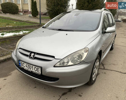 Сірий Пежо 307, об'ємом двигуна 1.59 л та пробігом 300 тис. км за 2000 $, фото 3 на Automoto.ua
