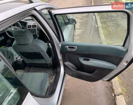 Сірий Пежо 307, об'ємом двигуна 1.59 л та пробігом 300 тис. км за 2000 $, фото 26 на Automoto.ua