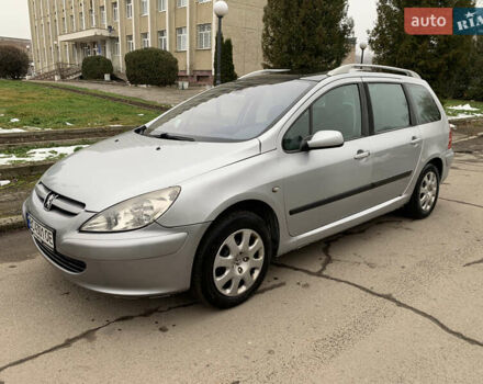 Сірий Пежо 307, об'ємом двигуна 1.59 л та пробігом 300 тис. км за 2000 $, фото 4 на Automoto.ua