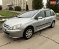 Сірий Пежо 307, об'ємом двигуна 1.59 л та пробігом 300 тис. км за 2000 $, фото 4 на Automoto.ua
