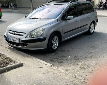 Серый Пежо 307, объемом двигателя 1.59 л и пробегом 192 тыс. км за 4500 $, фото 11 на Automoto.ua