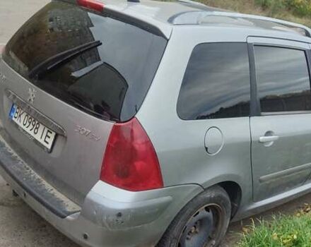 Сірий Пежо 307, об'ємом двигуна 2.01 л та пробігом 324 тис. км за 3000 $, фото 5 на Automoto.ua