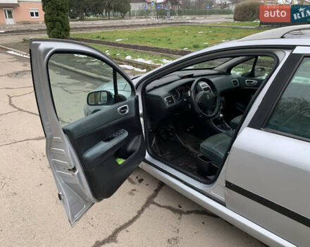 Сірий Пежо 307, об'ємом двигуна 1.59 л та пробігом 300 тис. км за 2000 $, фото 21 на Automoto.ua