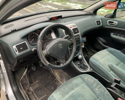 Сірий Пежо 307, об'ємом двигуна 1.59 л та пробігом 300 тис. км за 2000 $, фото 20 на Automoto.ua