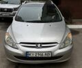 Серый Пежо 307, объемом двигателя 2 л и пробегом 251 тыс. км за 4500 $, фото 1 на Automoto.ua