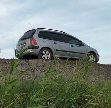 Серый Пежо 307, объемом двигателя 1.59 л и пробегом 192 тыс. км за 4500 $, фото 13 на Automoto.ua